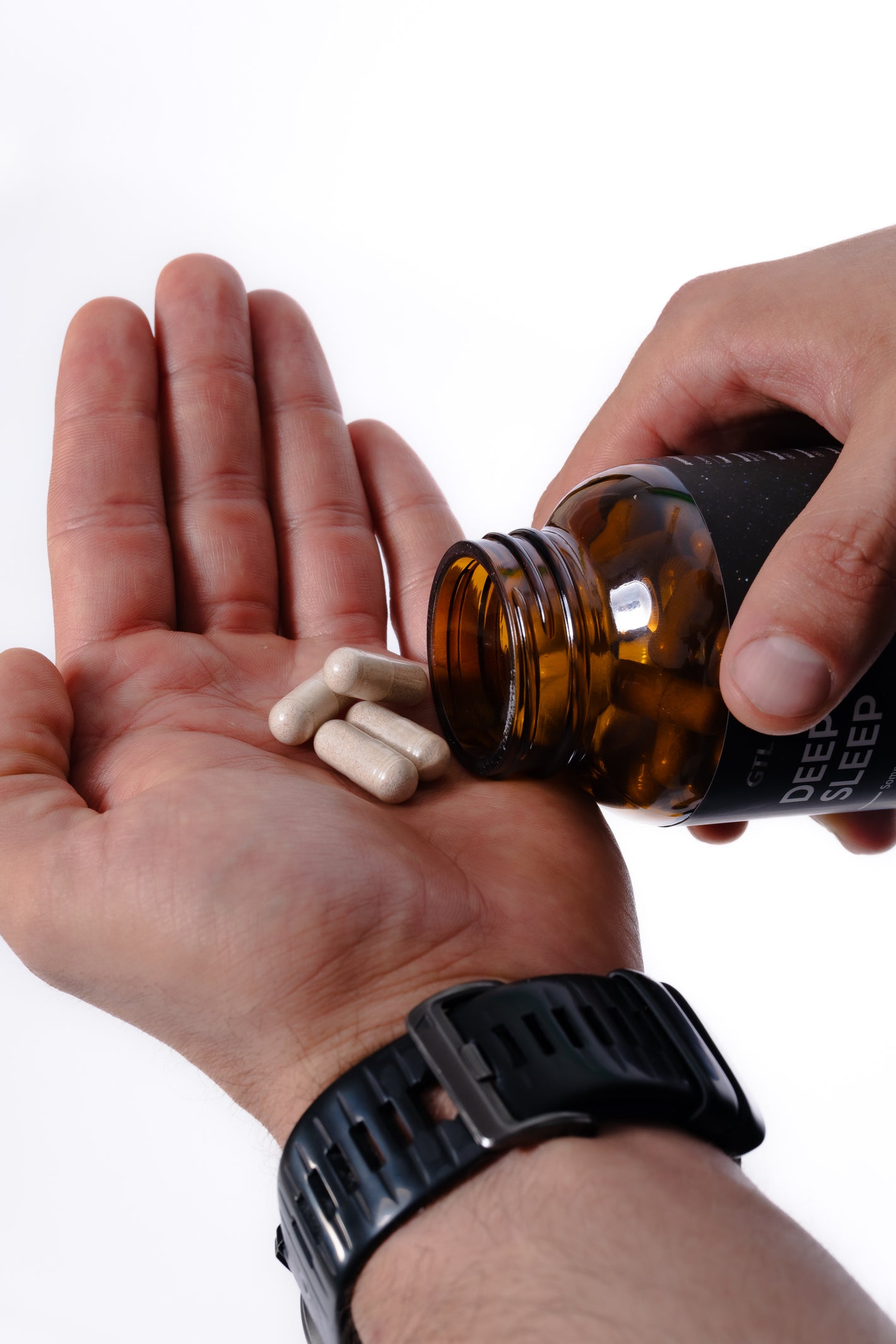 deep sleep capsules in hand